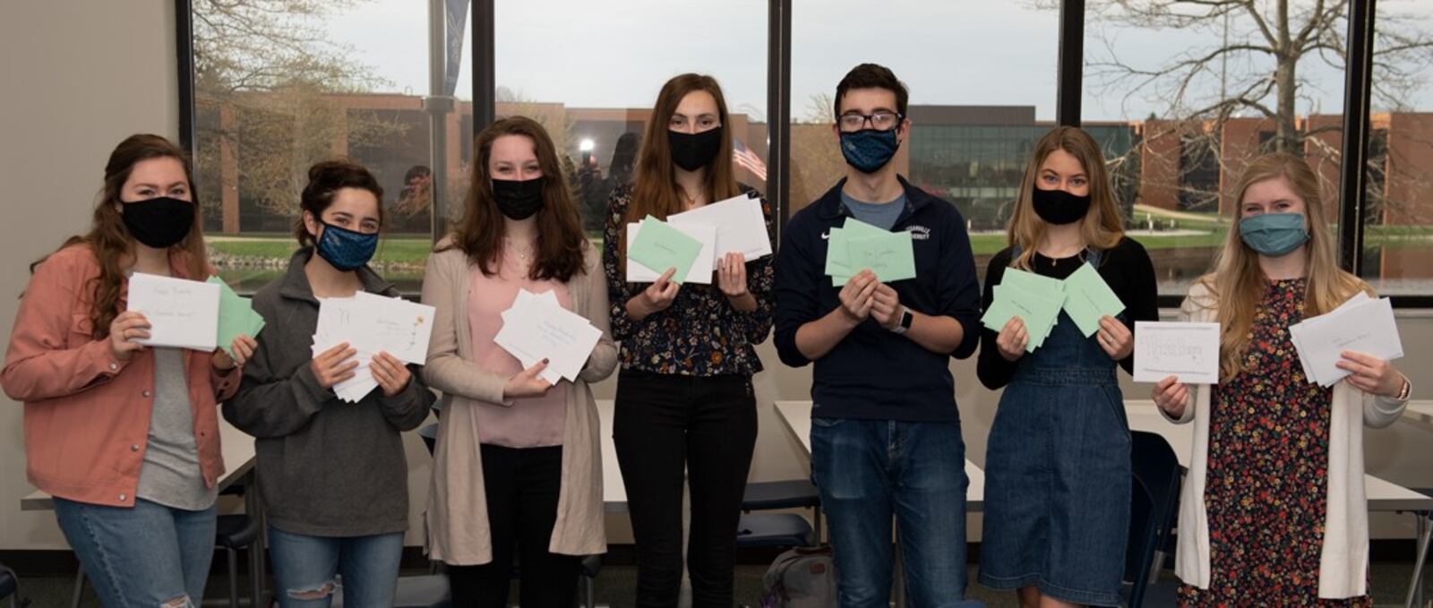 Cedarville University students with birthday cards for Geraldine Henry. CONTRIBUTED