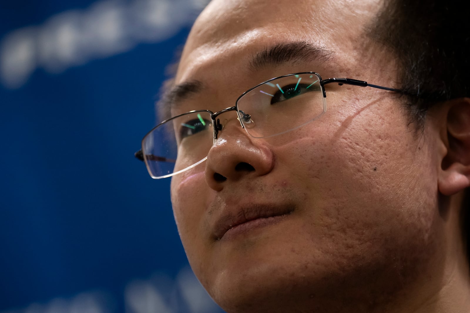 Dong Yifu, the son of imprisoned Chinese veteran journalist Dong Yuyu who was sentenced to seven years in prison on espionage charges, speaks about his father's detention to the National Press Club in Washington, Monday, Feb. 24, 2025. (AP Photo/Ben Curtis)