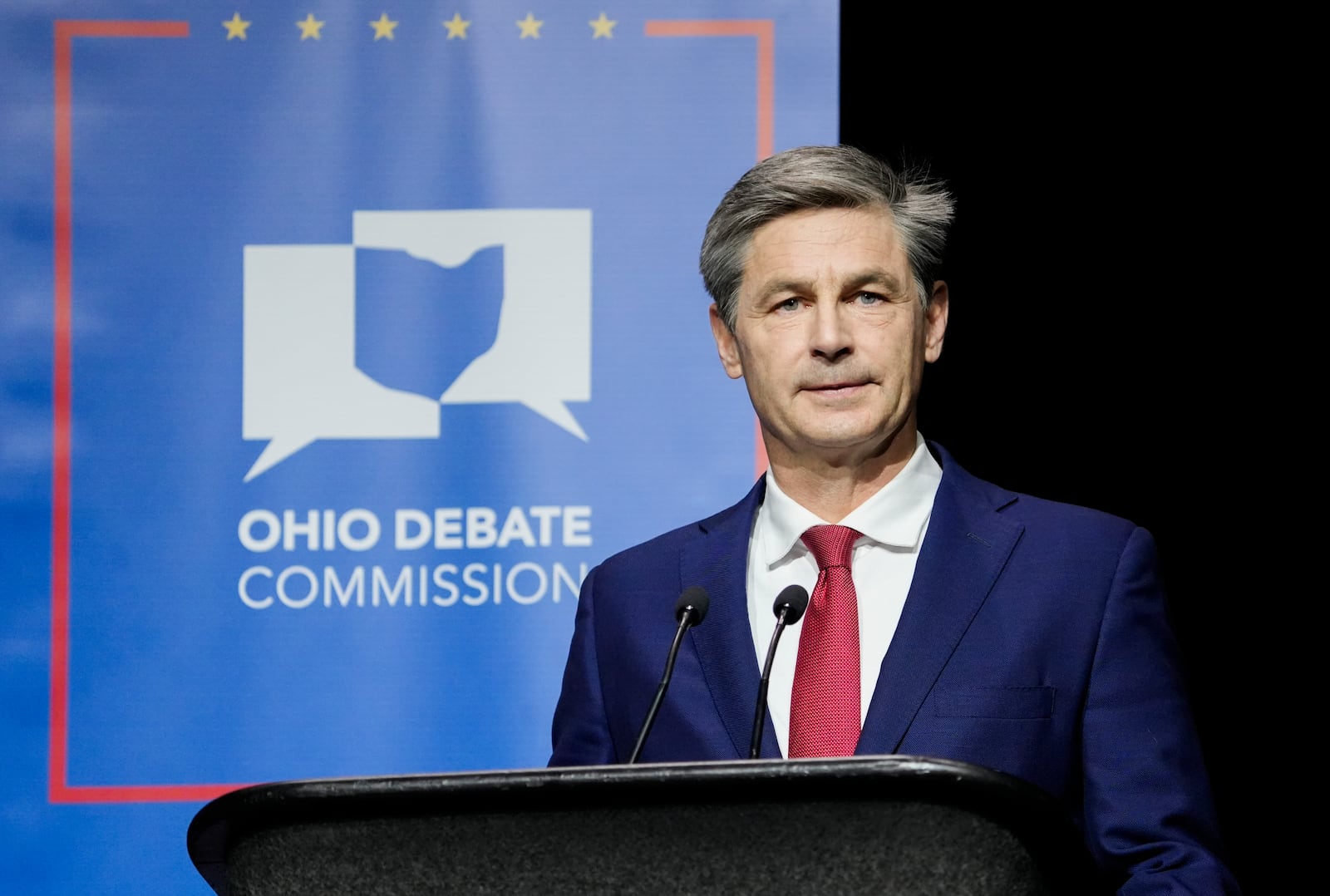 Mar 28, 2022; Wilberforce, Ohio, USA; U.S. Senate Republican candidate State Sen. Matt Dolan (R-Chagrin Falls) stands on stage before the start of Ohio’s U.S. Senate Republican Primary Debate at Central State University. Mandatory Credit: Joshua A. Bickel/Ohio Debate Commission