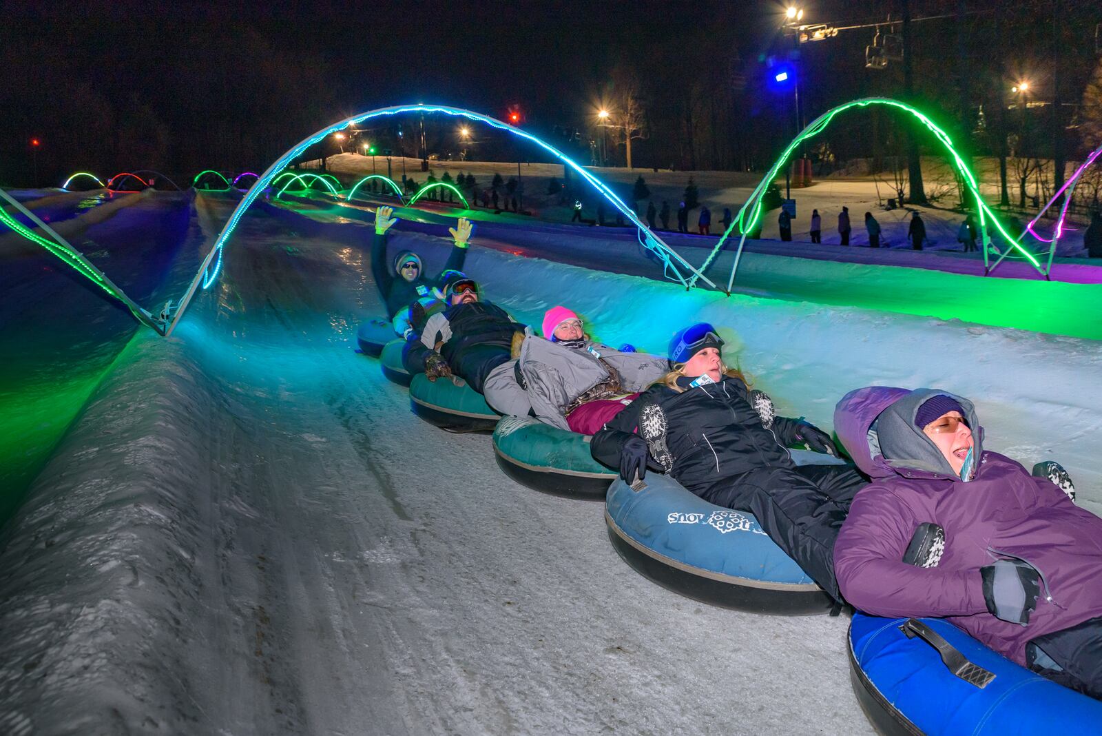 Guests participating in the glow tubing activity at Snow Trails in Mansfield.