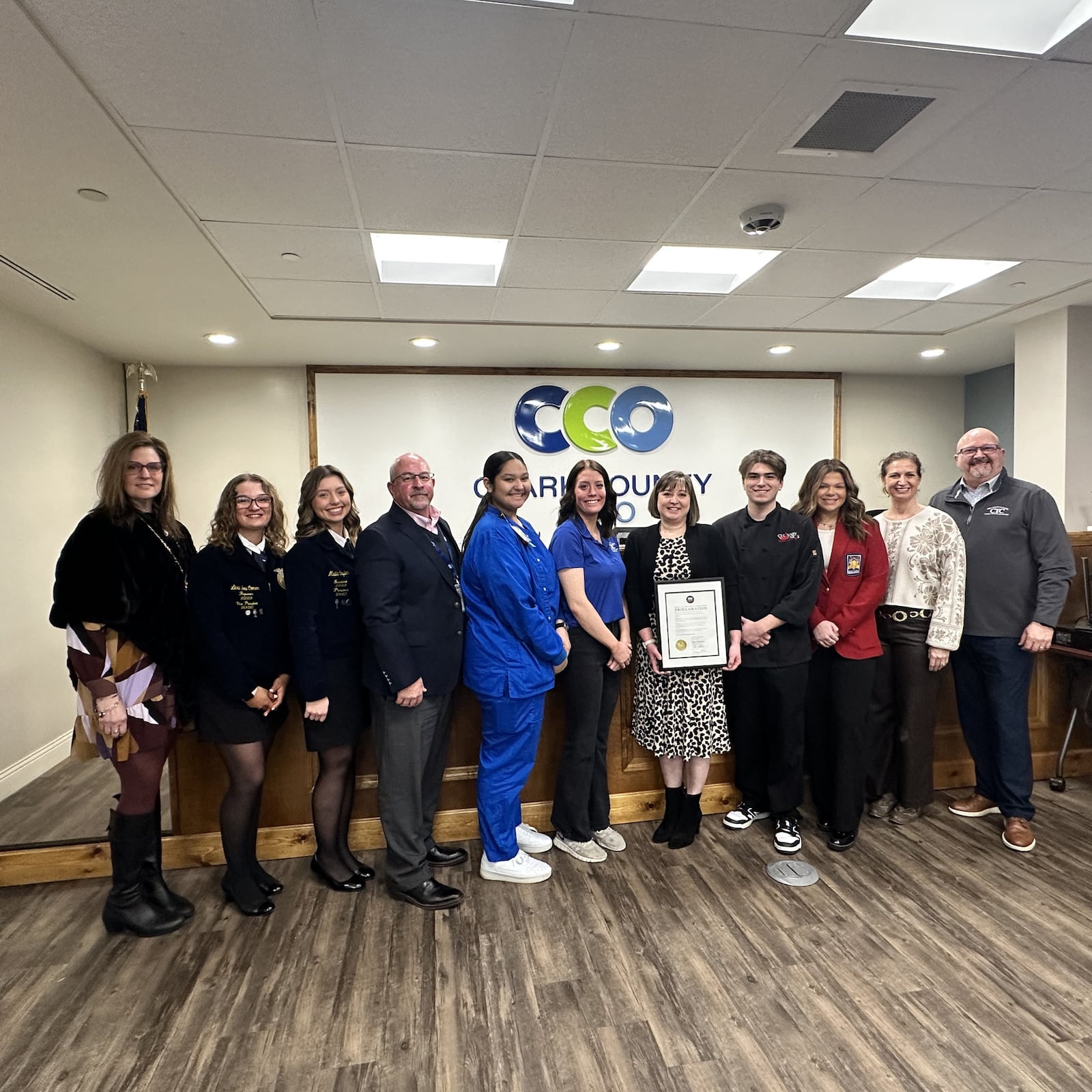 Springfield-Clark Career Technology students were issued a proclamation and recognized by Clark Cuunty Commissioners. In this photo (left to right) is Superintendent Michelle Patrick; Alexis Comer, senior from CTC’s satellite at Northwestern High School; Malia Snyder, senior from CTC’s satellite at Northwestern High School; Commissioner Charlie Patterson; Katalina Lopez, Medical Assisting senior from Kenton Ridge High School; Jalyleigh Brown, Veterinary Science senior from Kenton Ridge High School; Commissioner Sasha Rittenhouse; Owen Pollock, Culinary Arts senior from Northeastern High School; Arianna Collier, Cosmetology student for Kenton Ridge High School; Commissioner Melanie Wilt; and Michael Rice, CTC Associate Schools Coordinator. Contributed