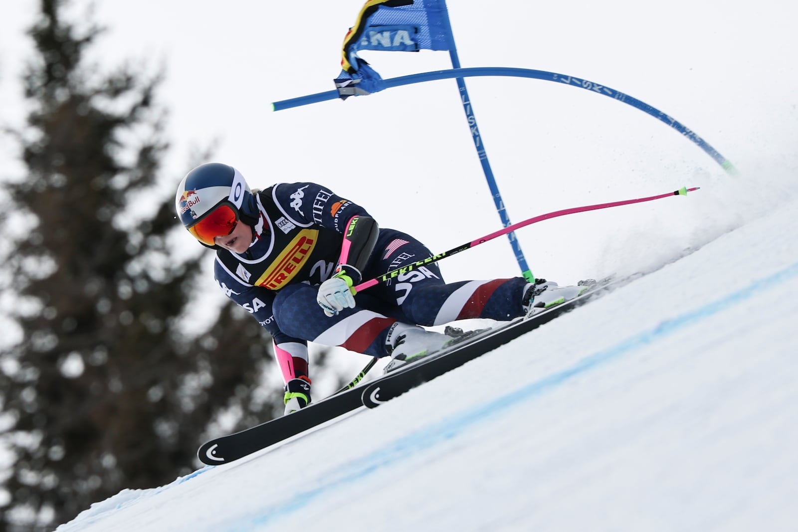 United States' Lindsey Vonn speeds down the course during an alpine ski, women's World Cup Super-G, in Cortina d'Ampezzo, Italy, Sunday, Jan. 19, 2025 (AP Photo/Marco Trovati)