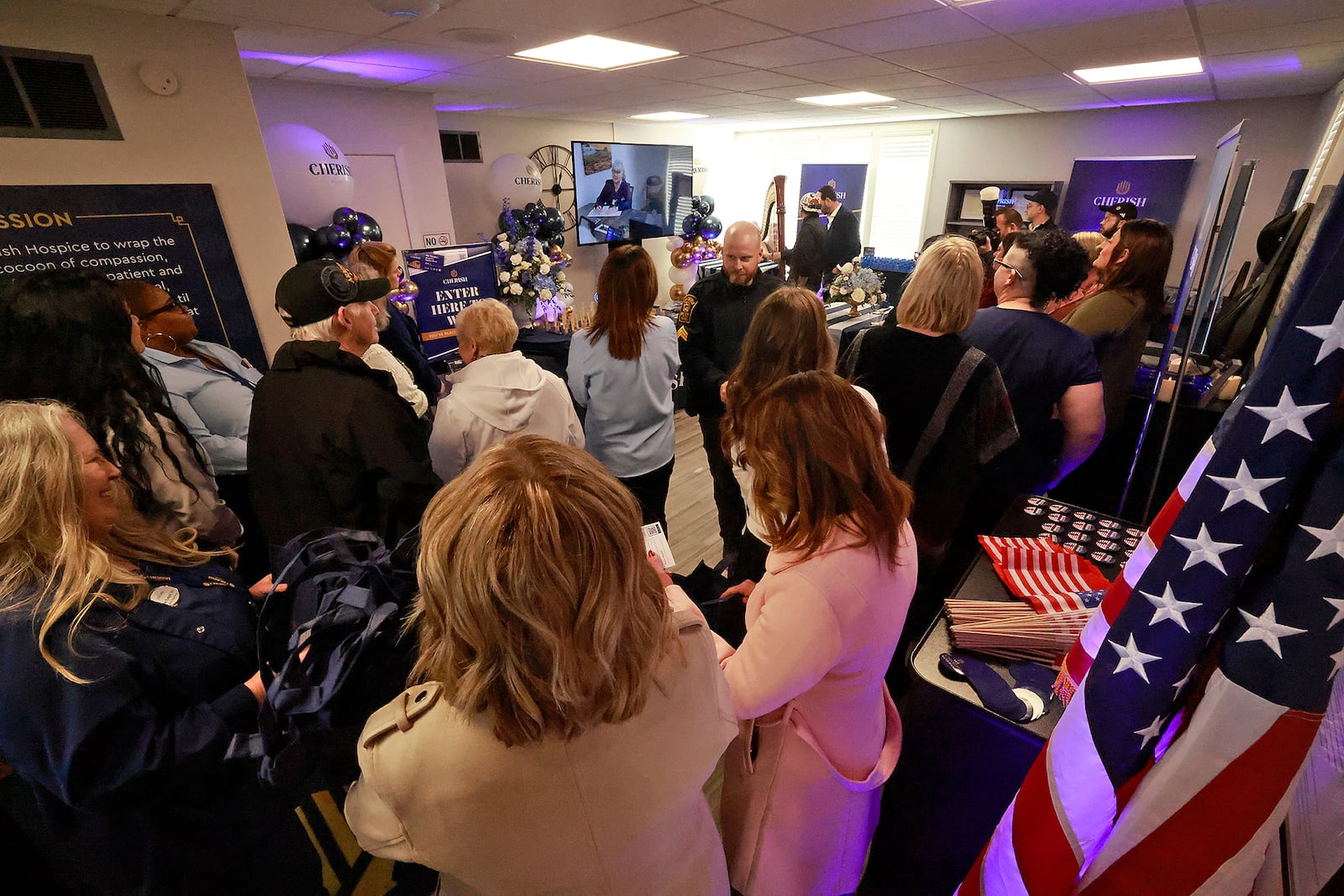 Visitors tour Cherish Hospice's new Ohio headquarters on East High Street in Springfield Tuesday, Dec. 17, 2024 following a ribbon cutting ceremony. BILL LACKEY/STAFF