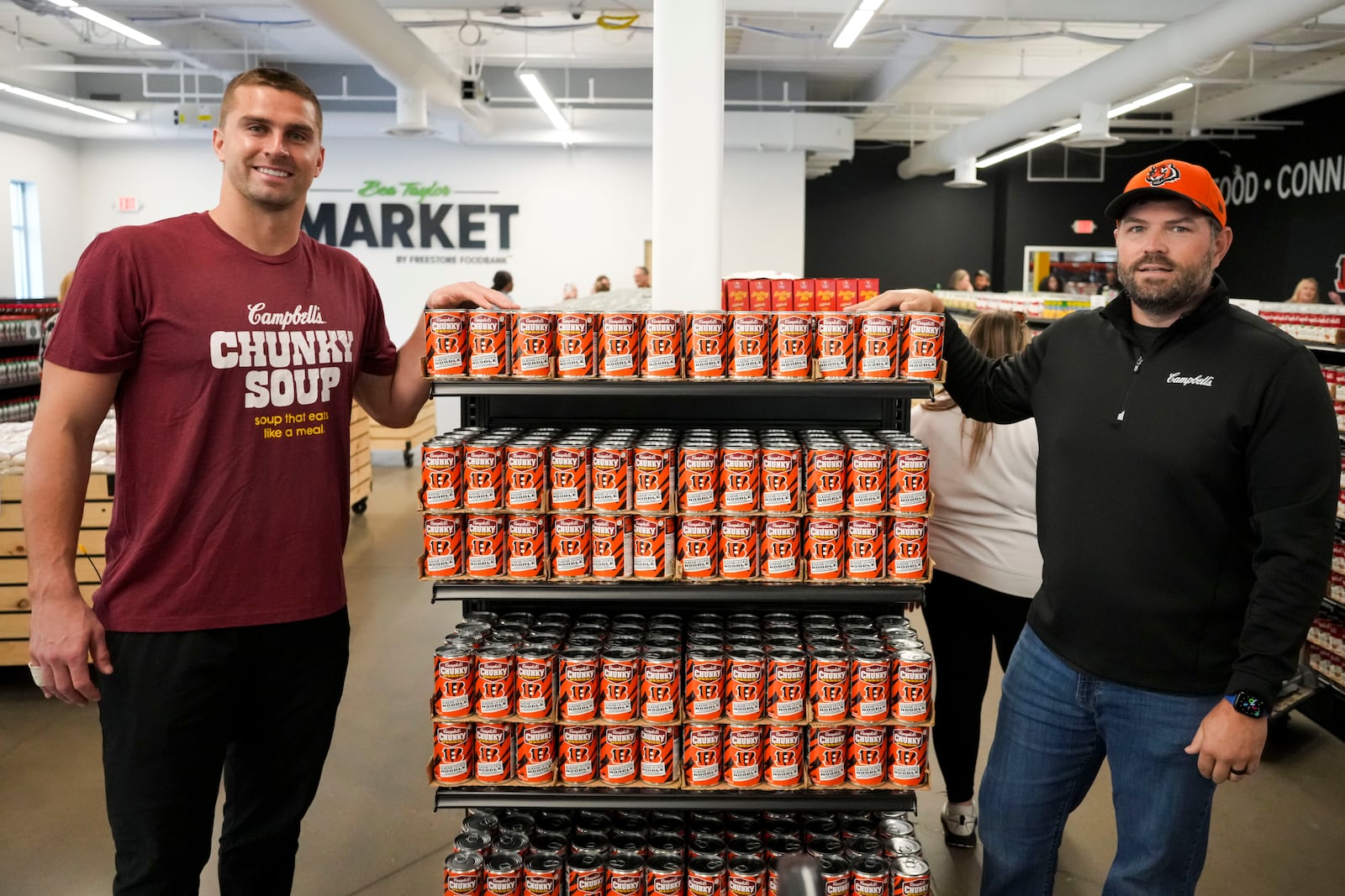 Campbell's Chunky and Cincinnati Bengals defensive end Sam Hubbard, give back to the Cincinnati community to help fight food insecurity as part of the brand's community program, Chunky Sacks Hunger, at Freestore Food Bank on Tuesday, Oct. 22, 2024 in Cincinnati. (Aaron Doster/AP Content Services for Campbell's Chunky)