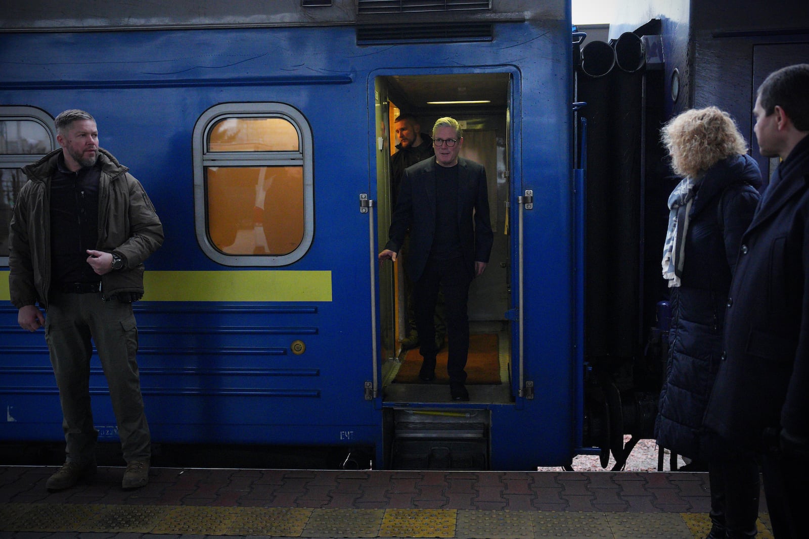 British Prime Minister Keir Starmer, center, arrives at a train station in Kyiv, Ukraine Thursday, Jan. 16, 2025. (Carl Court/Pool Photo via AP)