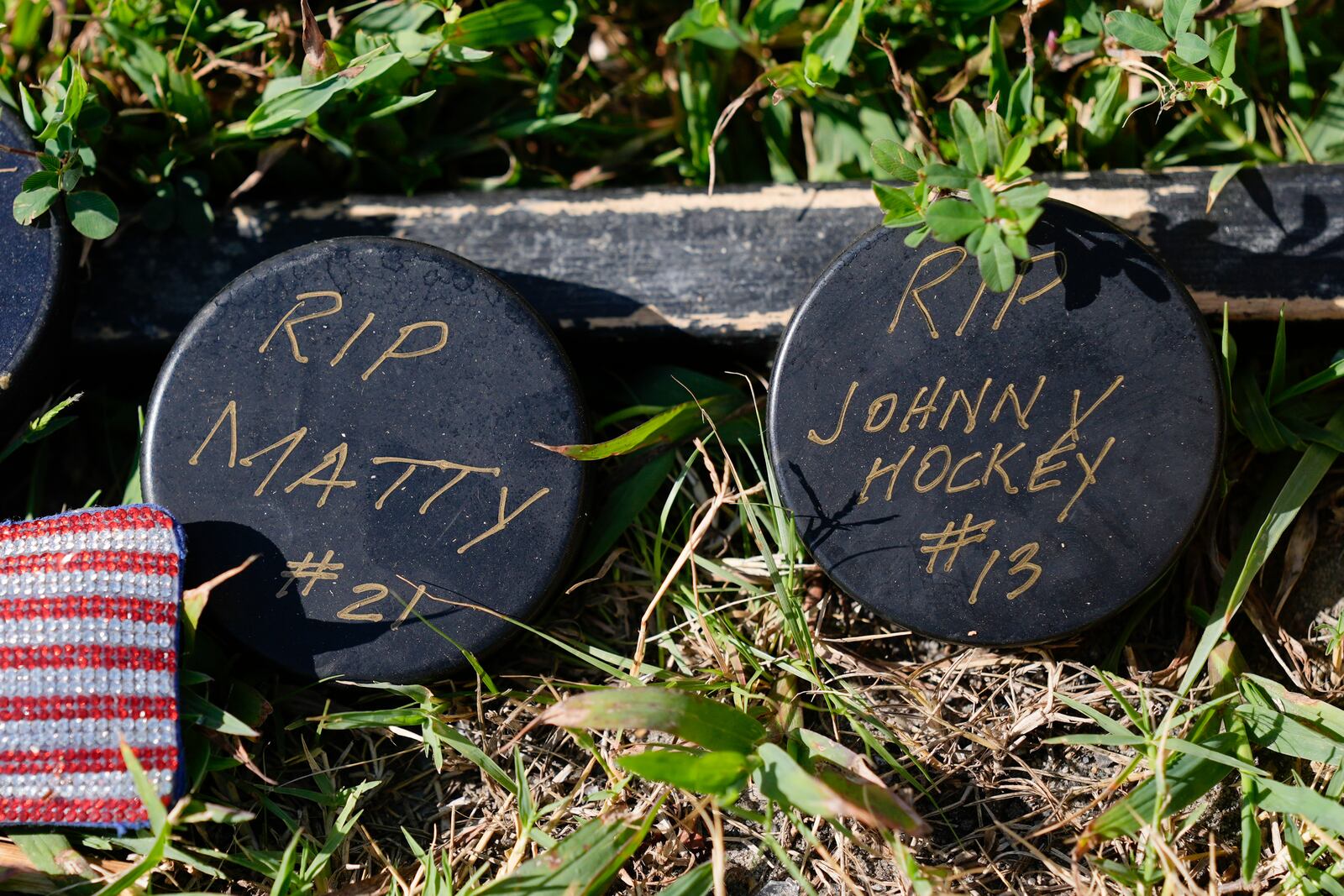 FILE - Shown is a makeshift memorial for NHL hockey player Johnny Gaudreau and his brother Matthew who were killed by a suspected drunken driver as they bicycled on a rural road, Sept. 5, 2024, in Oldmans Township , N.J. (AP Photo/Matt Rourke, file)