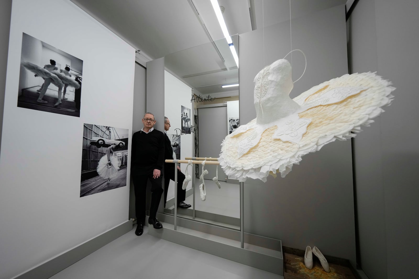 Photographer Gerard Uferas poses during the unveiling of the photo exhibition 'Lo sguardo nascosto' ( The hidden gaze), at the La Scala Opera House in Milan, Italy, Tuesday, Feb. 11, 2025. (AP Photo/Luca Bruno)