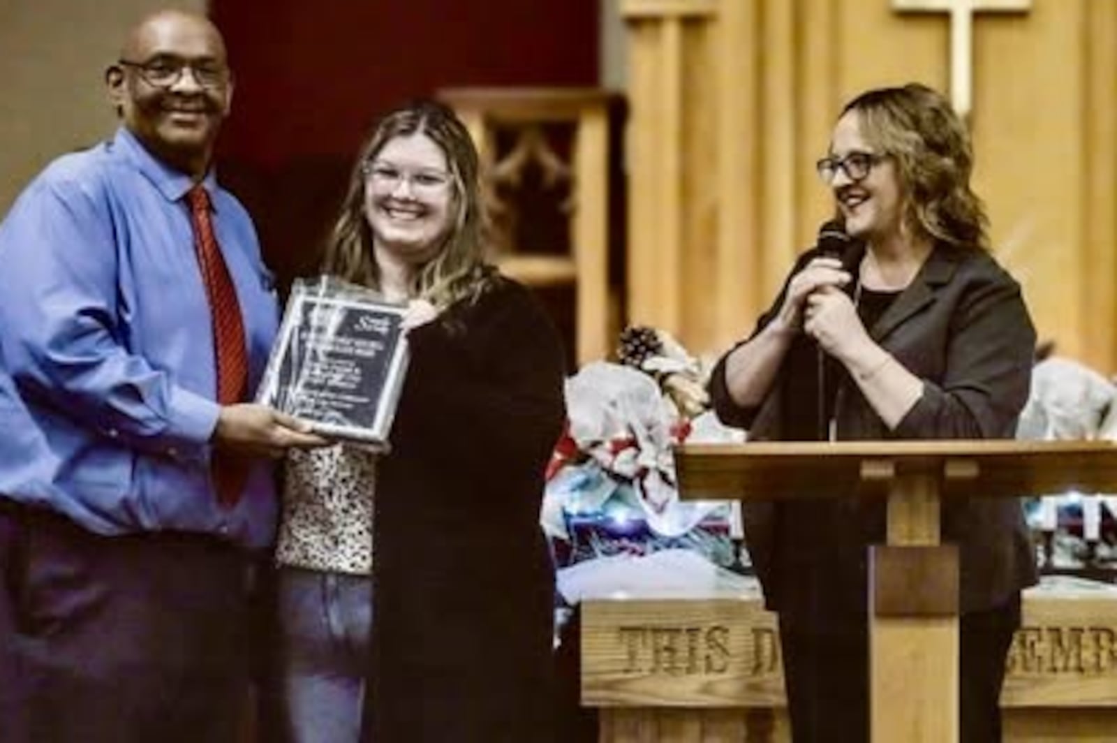 Julius Bailey, award winner, Eryca Payne of Springfield City Youth Mission and Amy Willmann of Nehemiah Foundation at the 2024 Simply Serving event. Contributed