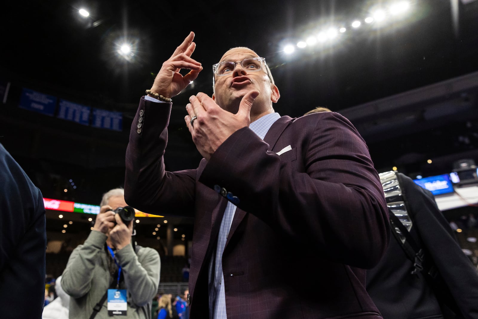 UConn head coach Dan Hurley motions to the crowd as he exits the court after an NCAA college basketball game against Creighton, Tuesday, Feb. 11, 2025, in Omaha, Neb. (AP Photo/Bonnie Ryan)