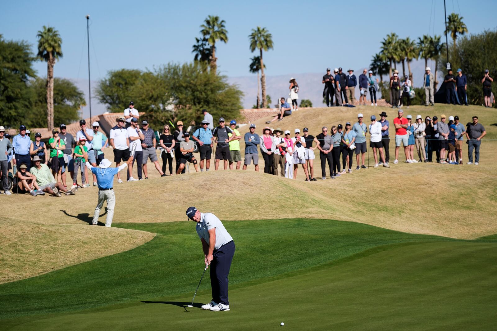 Sepp Straka putts on the fourth green at the Pete Dye Stadium Course during the final round of the American Express golf tournament in La Quinta, Calif., Sunday, Jan. 19, 2025. (AP Photo/William Liang)