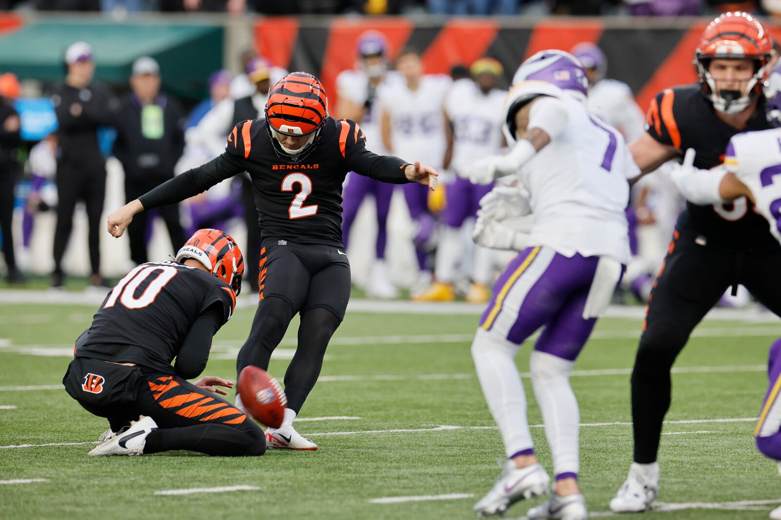 Cincinnati Bengals place kicker Evan McPherson (2) kicks the game-winning field goal in overtime of an NFL football game against the Minnesota Vikings Saturday, Dec. 16, 2023, in Cincinnati. (AP Photo/Jay LaPrete)