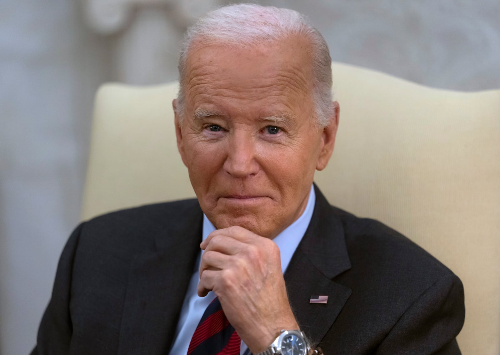 President Joe Biden looks toward the media as he meets with Slovenia's Prime Minister Robert Golob in the Oval Office of the White House in Washington, Tuesday, Oct. 22, 2024. (AP Photo/Ben Curtis)