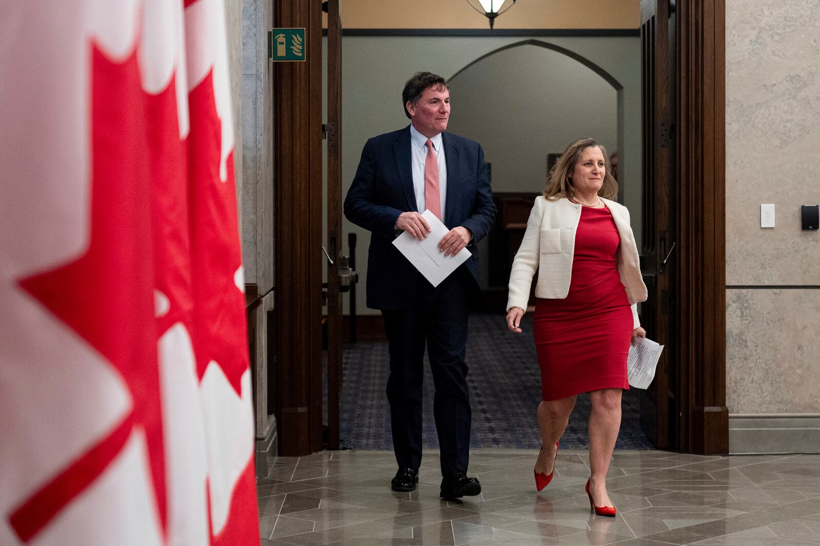 Minister of Finance and Deputy Prime Minister Chrystia Freeland, right, and Minister of Public Safety, Democratic Institutions and Intergovernmental Affairs Dominic LeBlanc arrive for a press conference on Parliament Hill in Ottawa, Ontario, Wednesday, Dec. 11, 2024. (Spencer Colby/The Canadian Press via AP)