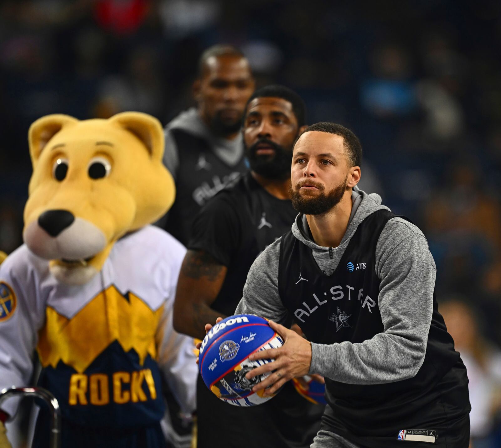 Golden State Warriors' Stephen Curry shoots from half-court during practice for the NBA All-Star basketball game, Saturday, Feb. 15, 2025, in Oakland, Calif. (Jose Carlos Fajardo/Bay Area News Group via AP)