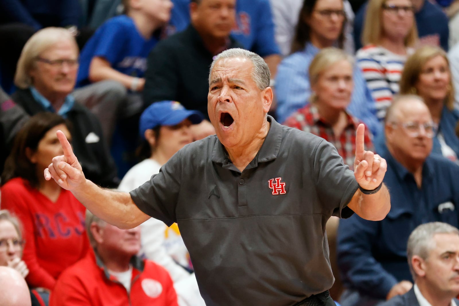 Houston head coach Kelvin Sampson reacts during the first half of an NCAA college basketball game against Kansas, Saturday, Jan. 25, 2025, in Lawrence, Kan. (AP Photo/Colin E. Braley)