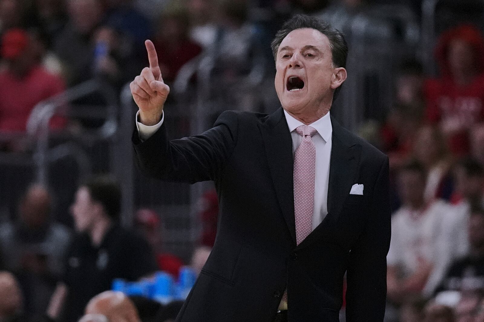 St. John's head coach Rick Pitino calls to his players during the first half in the second round of the NCAA college basketball tournament, Saturday, March 22, 2025, in Providence, R.I. (AP Photo/Charles Krupa)