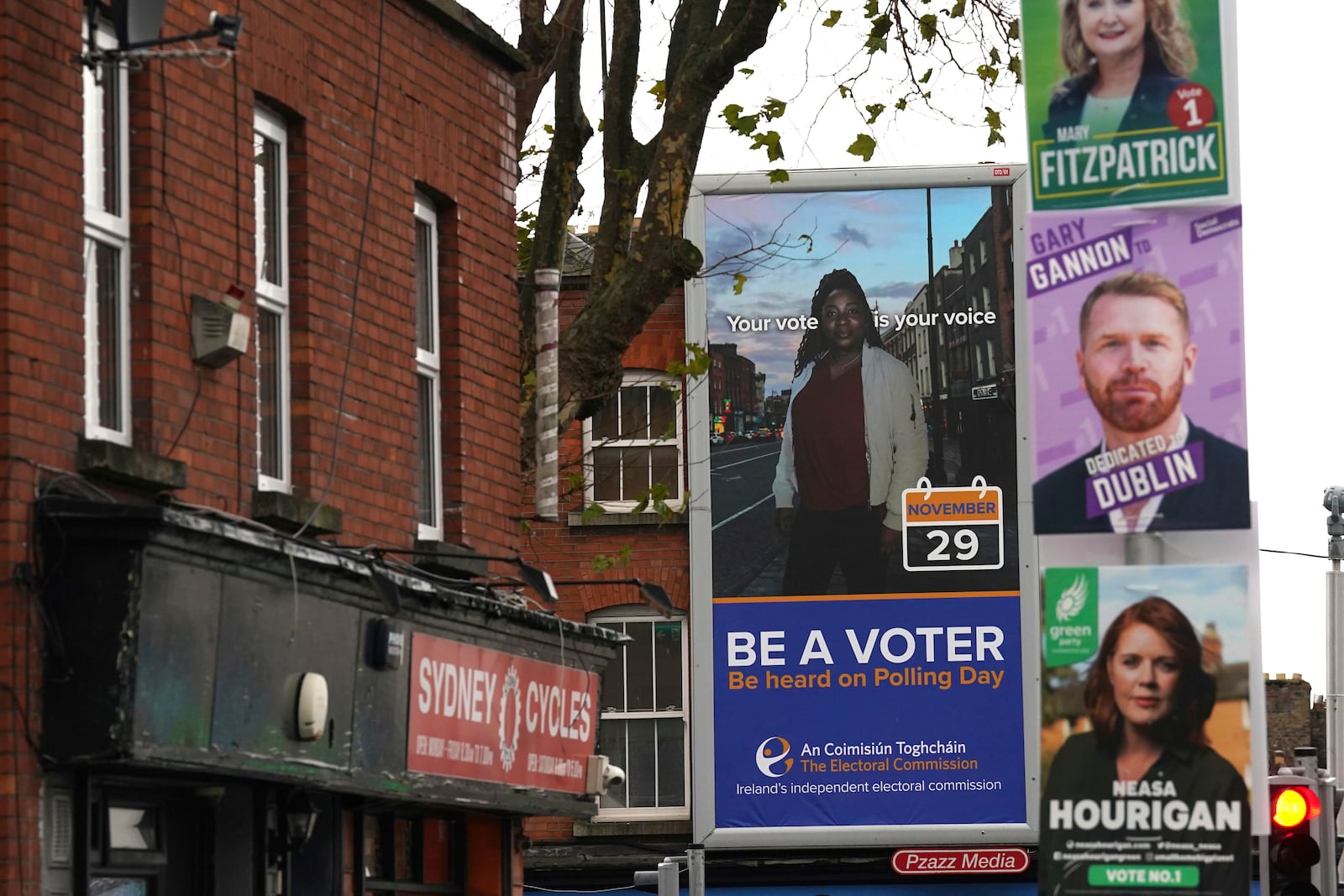 A poster by the Electoral Commission is displayed in Dublin, Friday Nov. 29, 2024, as voters go to the polls in the 2024 General Election in Ireland. (Brian Lawless/PA via AP)