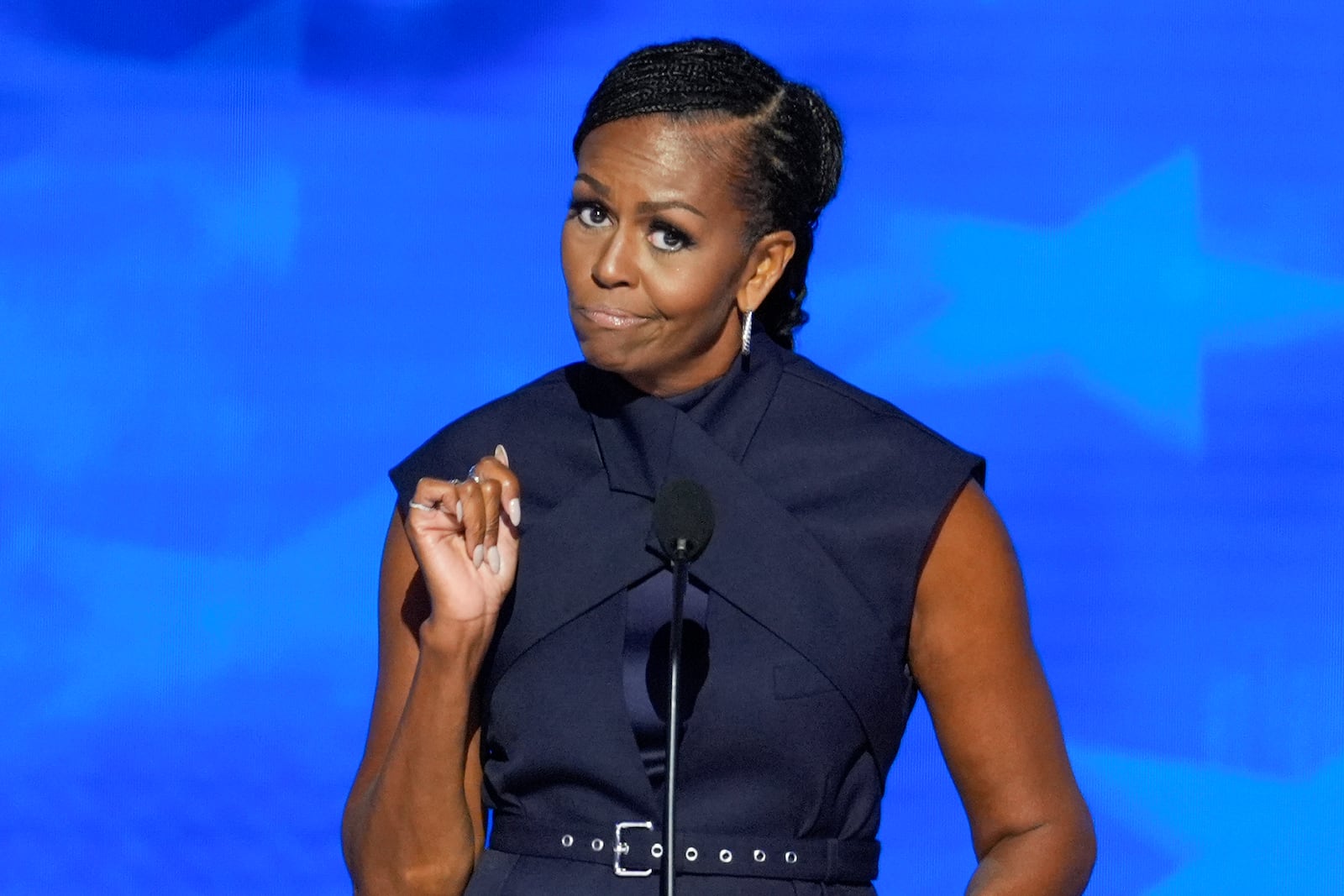 FILE - Former first lady Michelle Obama speaks during the Democratic National Convention, Aug. 20, 2024, in Chicago. (AP Photo/J. Scott Applewhite, File)