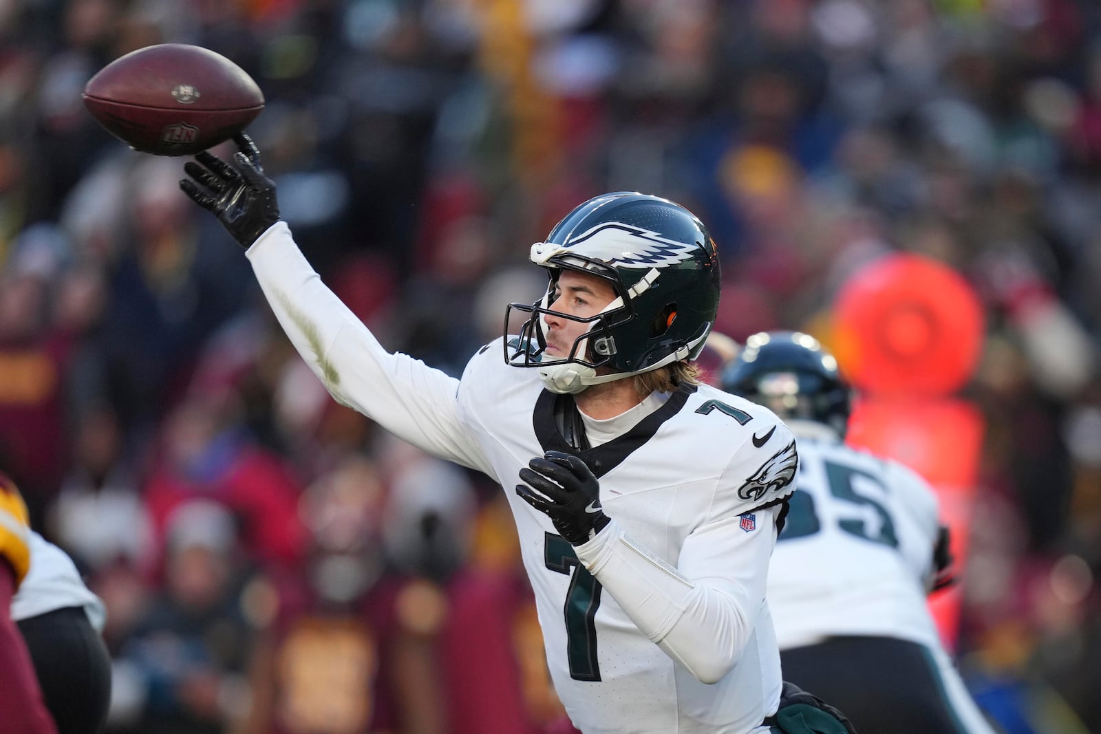 Philadelphia Eagles quarterback Kenny Pickett (7) throws a pass during the second half of an NFL football game against the Washington Commanders, Sunday, Dec. 22, 2024, in Landover, Md. (AP Photo/Stephanie Scarbrough)