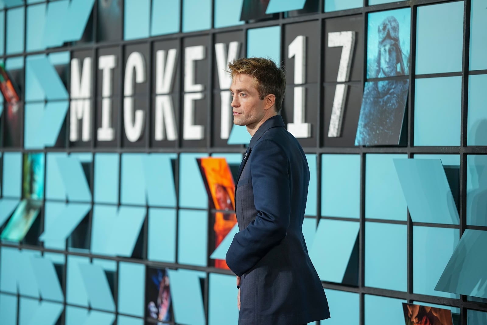 Robert Pattinson poses for photographers upon arrival at the World premiere for the film 'Mickey 17' on Thursday, Feb. 13, 2025, in London. (Photo by Scott A Garfitt/Invision/AP)