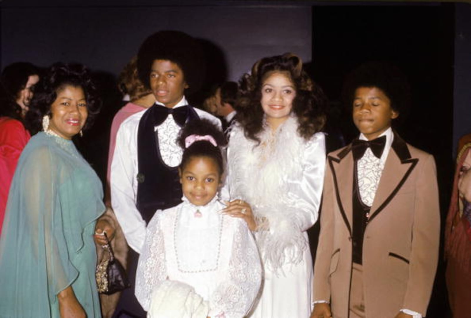 American singer Michael Jackson (1958 - 2009) with his mother Katherine, sisters Janet and La Toya and brother Randy at the wedding of older brother Jermaine Jackson to Berry Gordy's daughter Hazel in Hollywood, 15th December 1973. (Photo by Michael Ochs Archives/Getty Images)