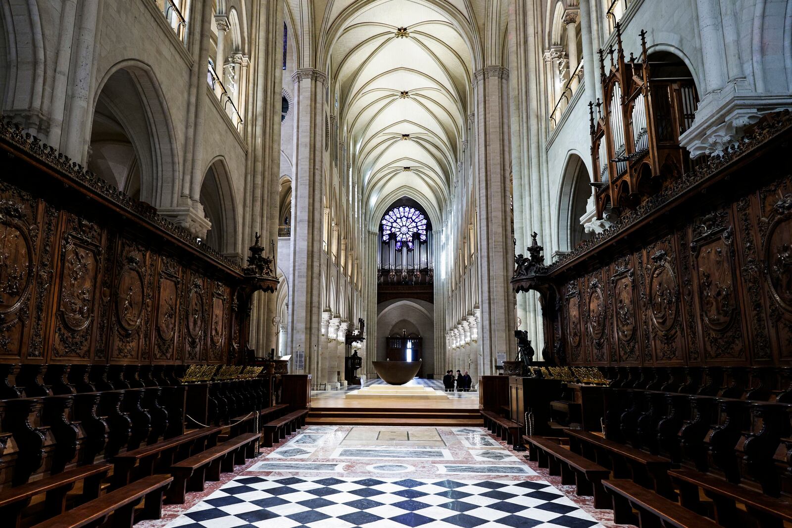 The choir stalls of Notre-Dame de Paris cathedral are seen while French President Emmanuel Macron visits the restored interiors of the monument, Friday Nov. 29, 2024, in Paris. (Stephane de Sakutin, Pool via AP)