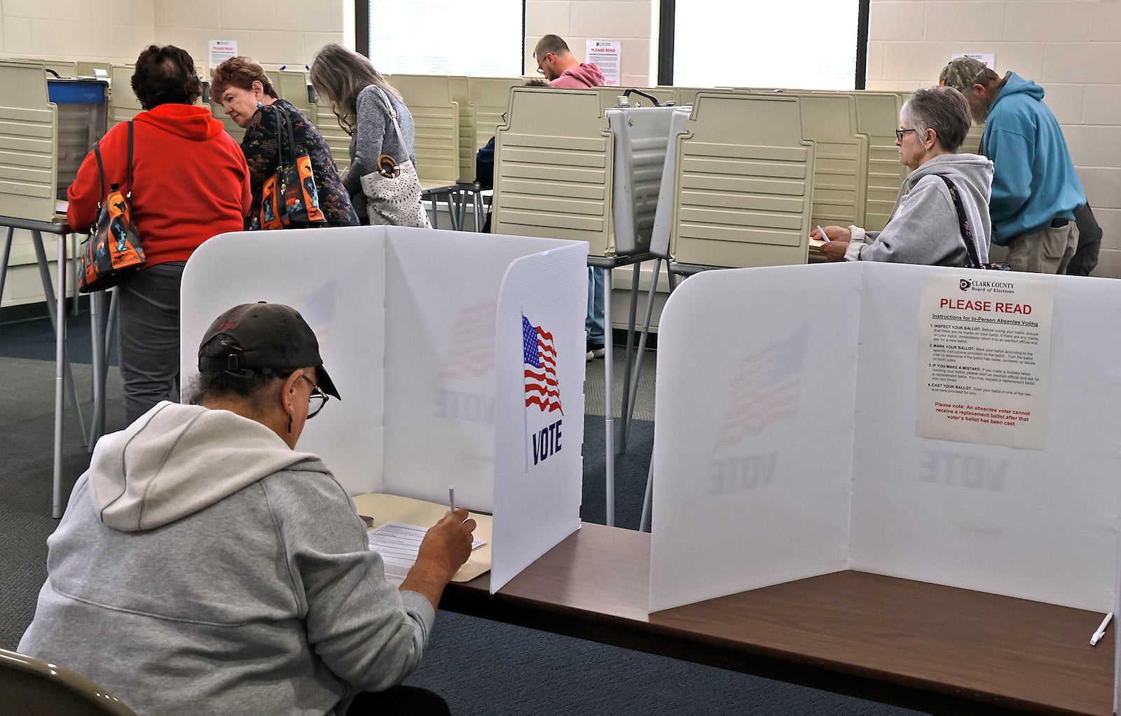 Early voters fills out their ballots Thursday, Oct. 17, 2024 at the Clark County Board of Elections. BILL LACKEY/STAFF