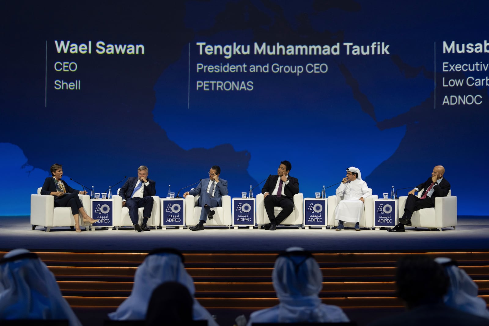 From left to right, Moderator Becky Anderson, Murray Auchincloss CEO BP, Wael Sawan CEO Shell, Tengku Muhammad Taufik President and CEO PETRONAS , Musabbeh Al Kaaba Executive Director ADNOC and Claudio Descalzi CEO Eni, participate in a panel during the Abu Dhabi International Petroleum Exhibition & Conference (ADIPEC) in Abu Dhabi, United Arab Emirates, Monday, Nov. 4, 2024. (AP Photo/Altaf Qadri)