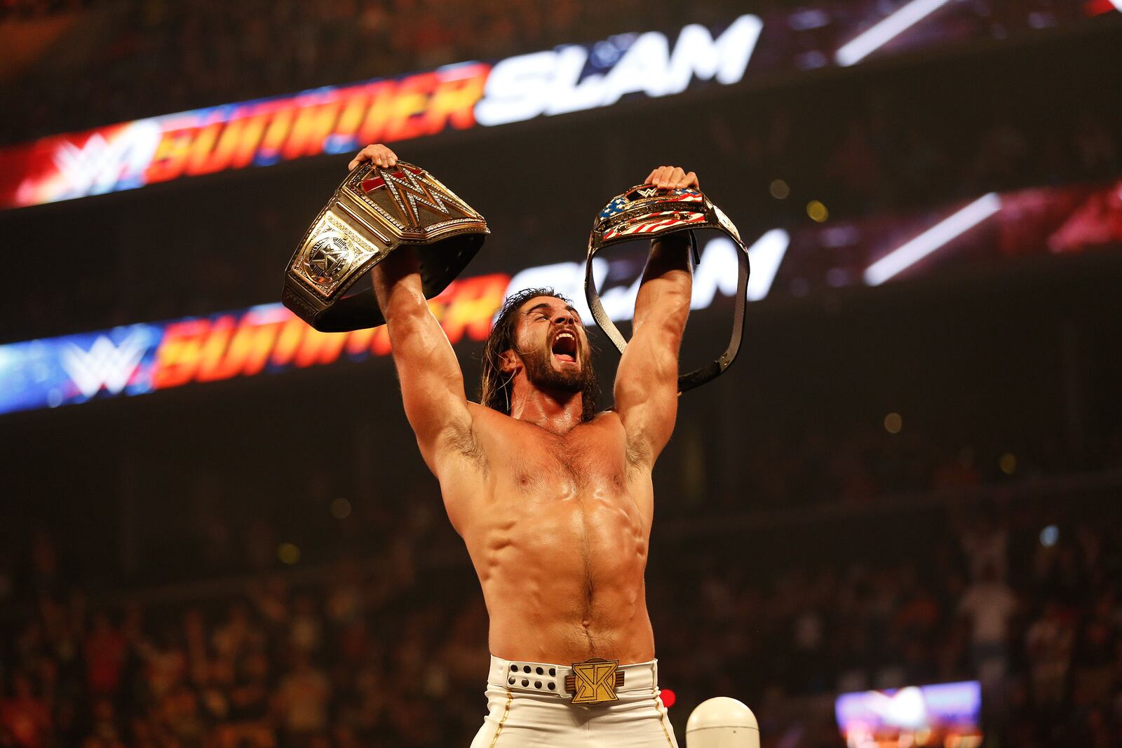 NEW YORK, NY - AUGUST 23:  Seth Rollins celebrates his victory over John Cena at the WWE SummerSlam 2015 at Barclays Center of Brooklyn on August 23, 2015 in New York City.  (Photo by JP Yim/Getty Images)