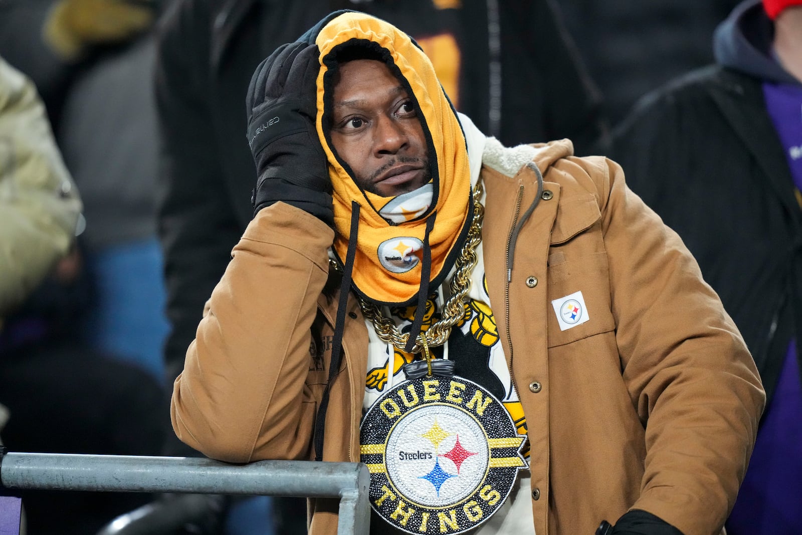 A Pittsburgh Steelers supporter looks on during the second half of an NFL wild-card playoff football game between the Baltimore Ravens and the Steelers, Saturday, Jan. 11, 2025, in Baltimore. (AP Photo/Stephanie Scarbrough)