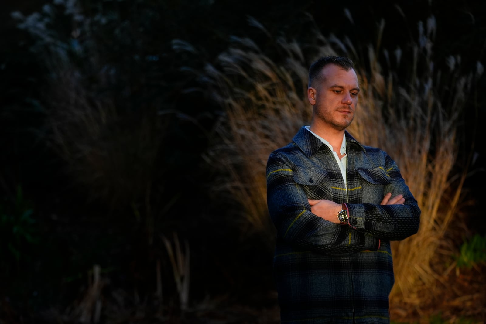 Recreational rugby player Sean McDowell, whose SafeSport case investigator Jason Krasley was fired after being arrested for stealing drug money in his previous job as a police officer, poses for a portrait Wednesday, Dec. 18, 2024, in Seattle. (AP Photo/Lindsey Wasson)