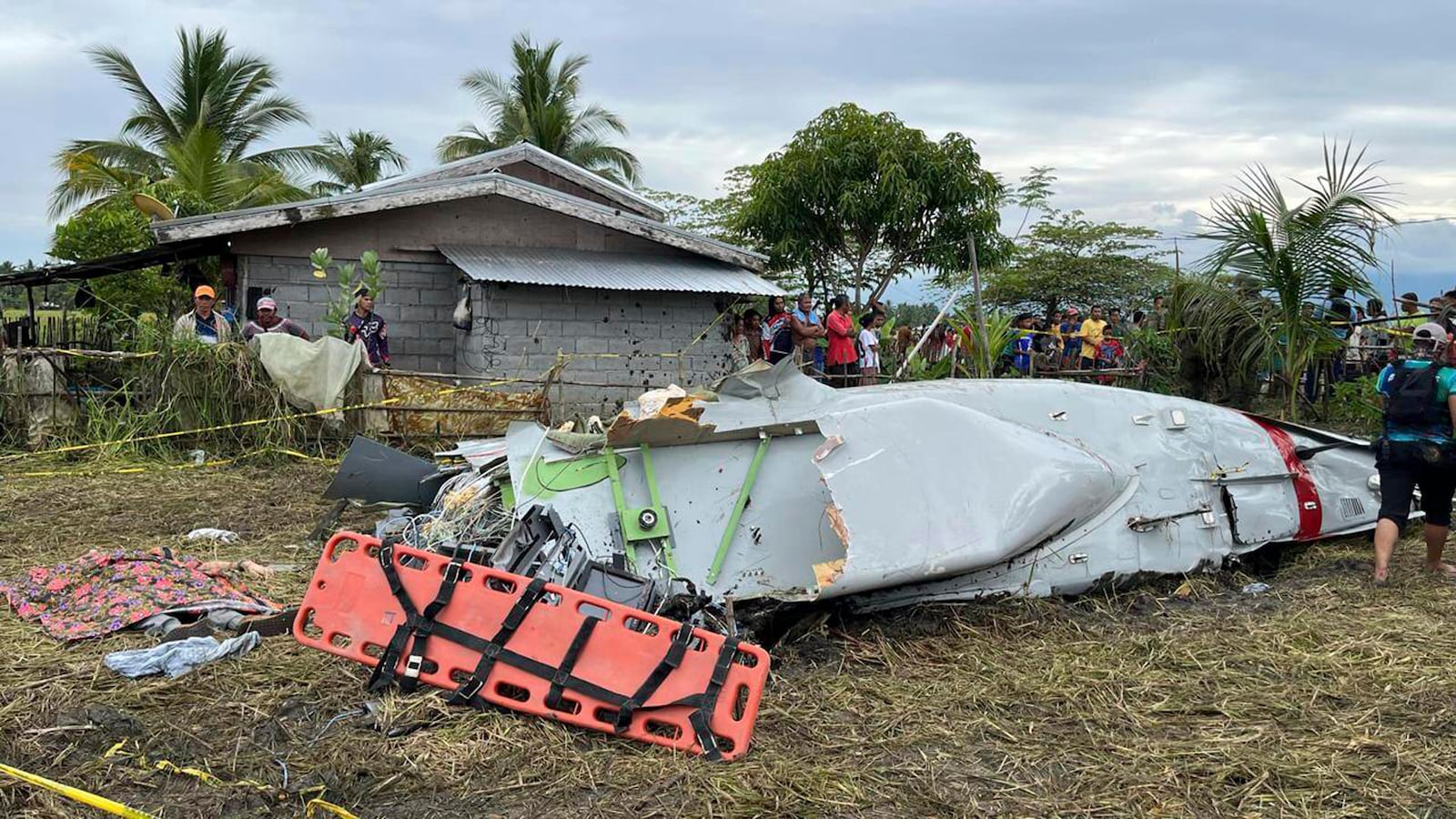 Wreckage of airplane in a rice field in Maguindanao del Sur province, Philippines, after officials say a U.S. military-contracted plane has crashed in a rice field in the southern Philippines, killing all four people on board, on Thursday Feb. 6, 2025. (Sam Mala/UGC via AP)