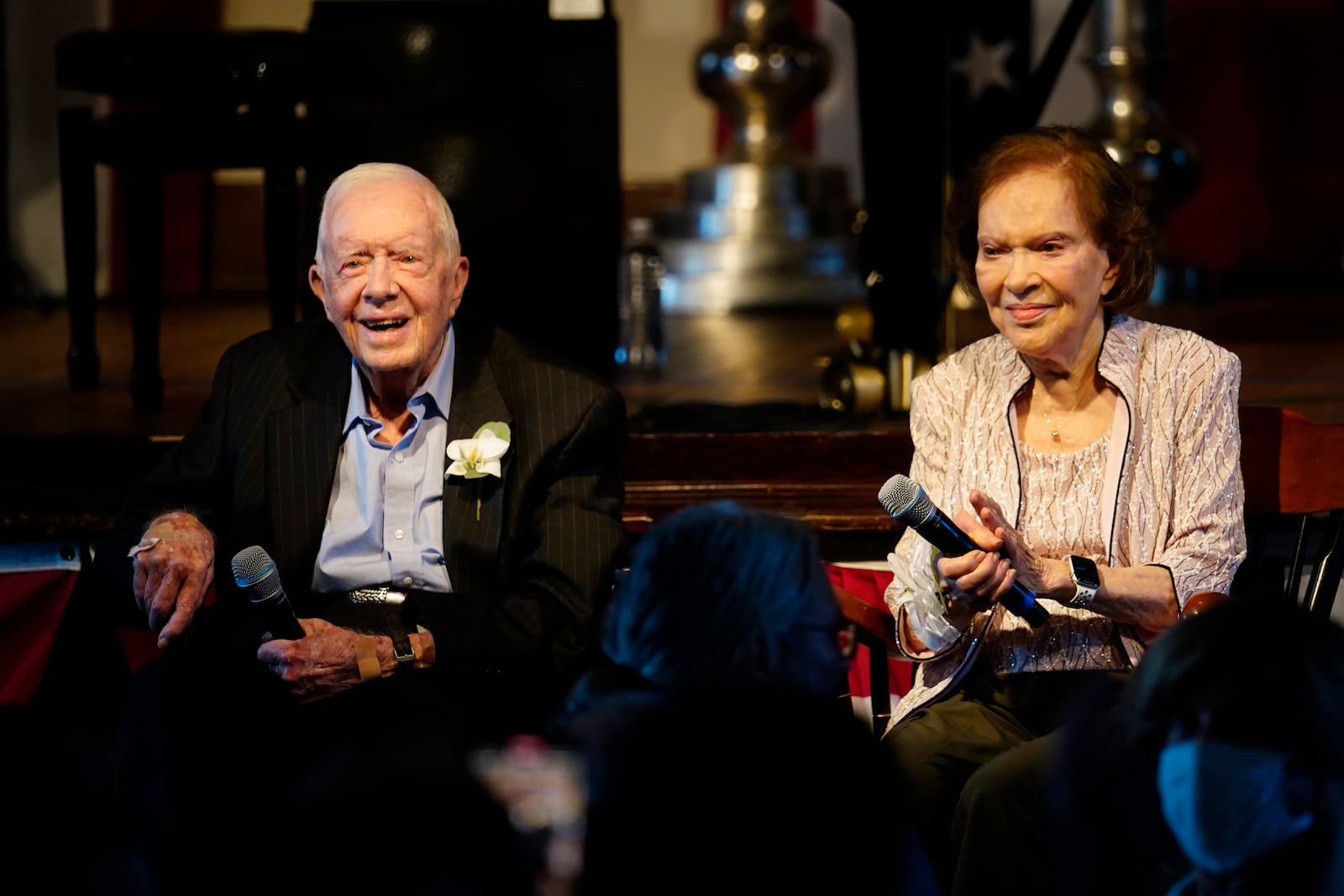 FILE - Former President Jimmy Carter, left, and his wife, former first lady Rosalynn Carter, sit together during a reception to celebrate their 75th anniversary, July 10, 2021, in Plains, Ga. (AP Photo/John Bazemore, Pool, File)