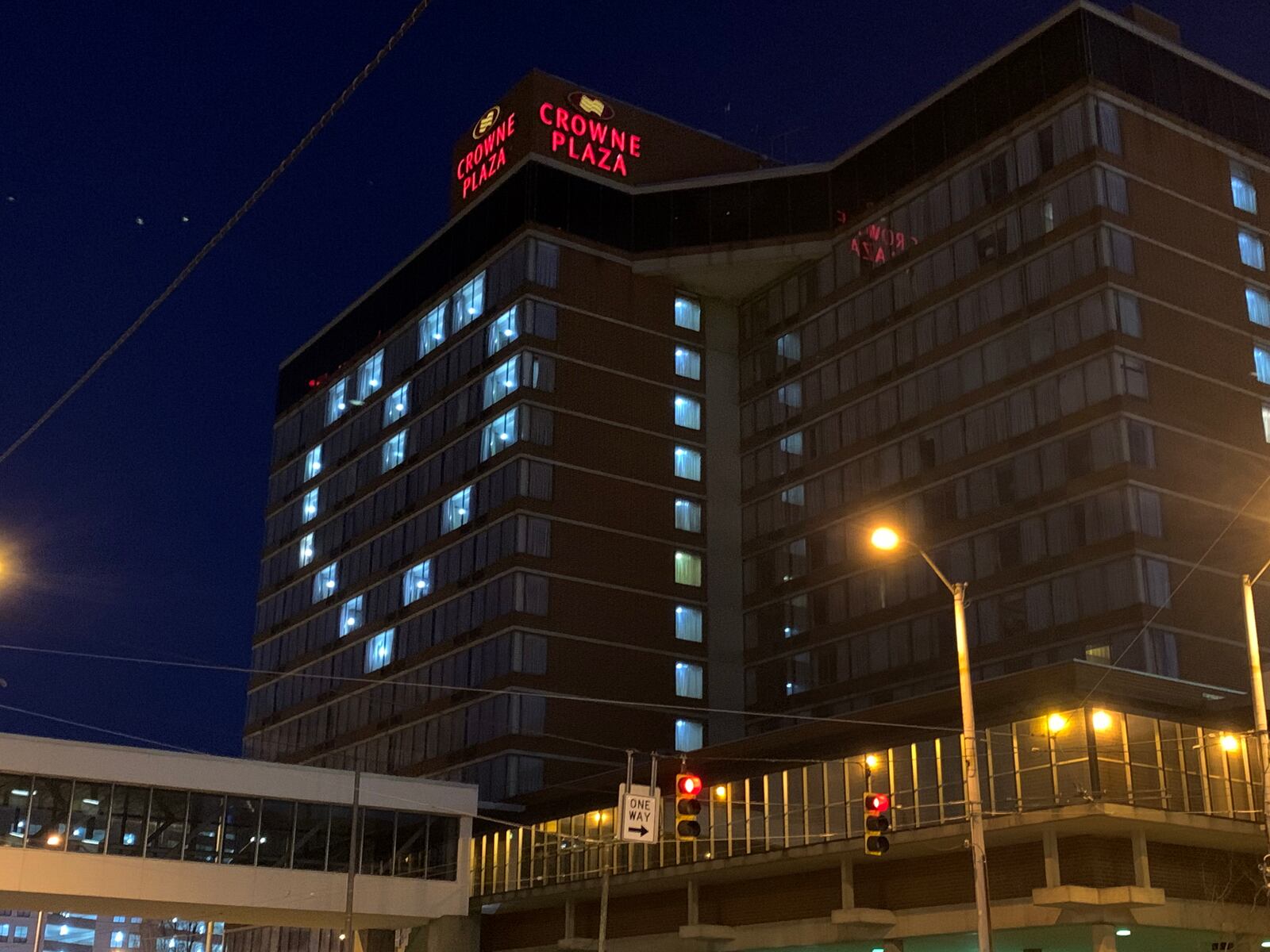 A beacon of love - a message during the coronavirus pandemic - is beaming from the Crowne Plaza Hotel in downtown Dayton. LISA POWELL / STAFF