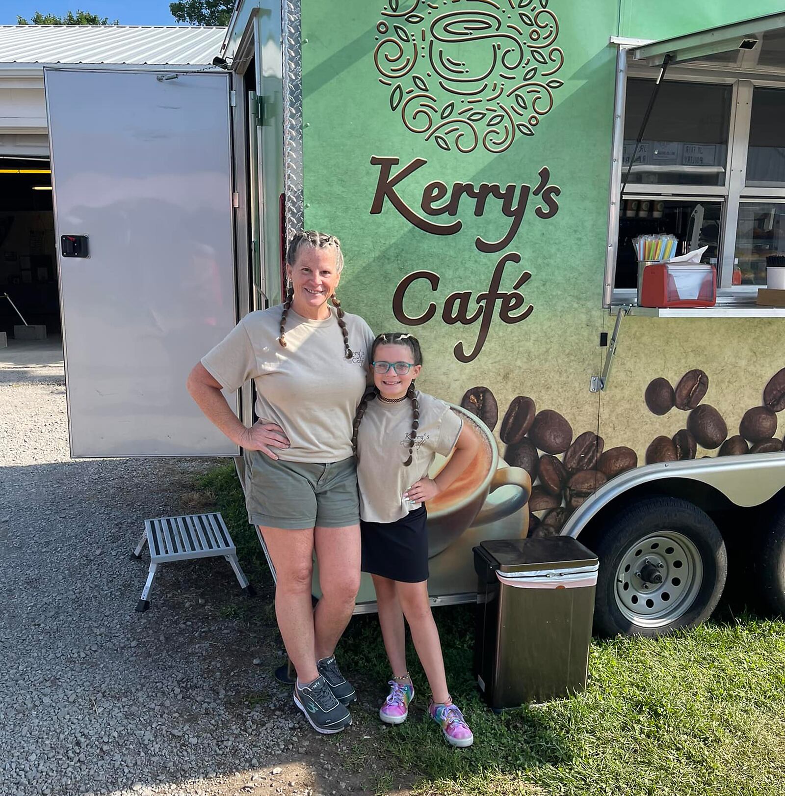 Kerry Schooler is shown with granddaughter Amiya Harris in front of Kerry’s Café mobile coffee shop. CONTRIBUTED