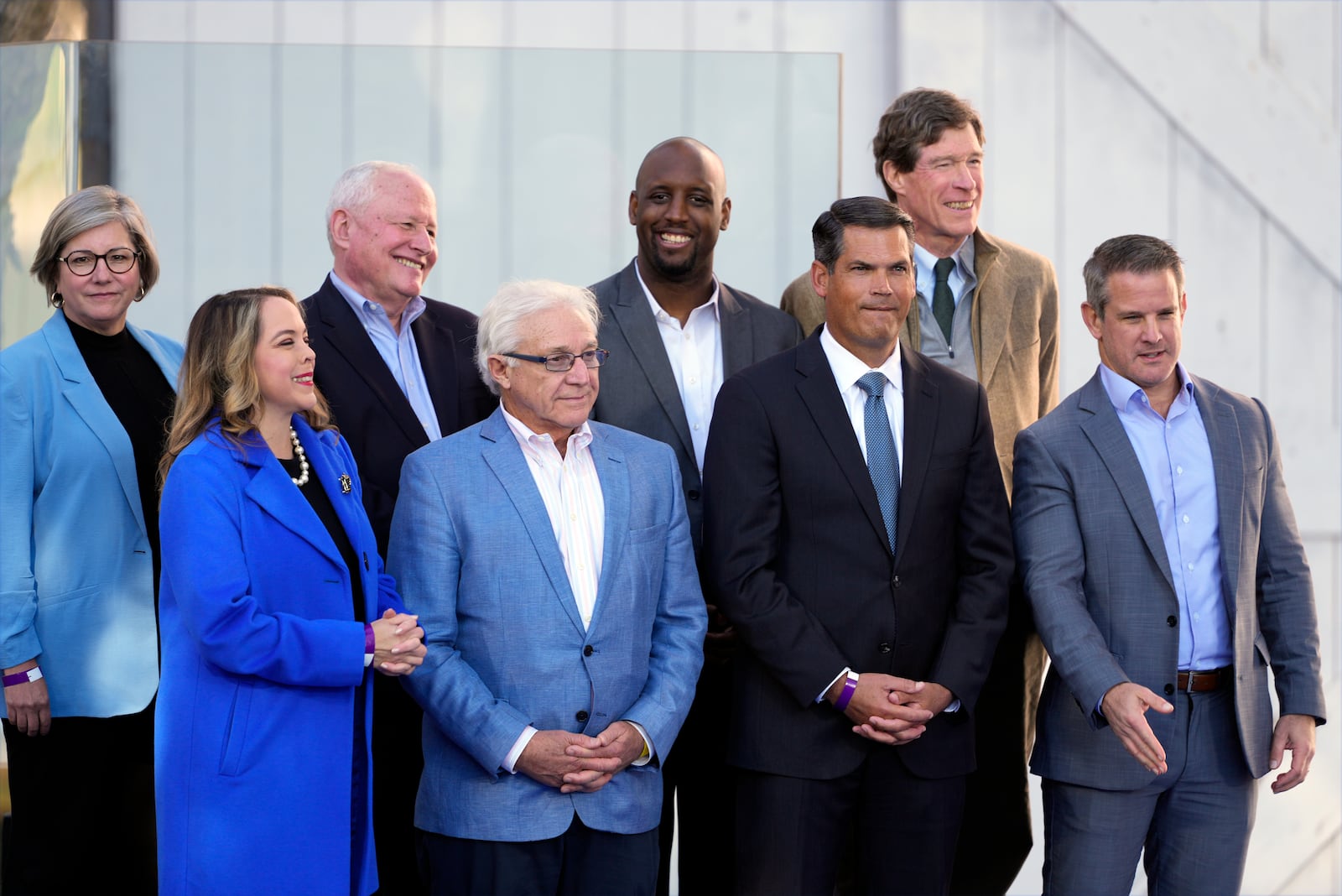 Republicans who are supporting Democratic presidential nominee Vice President Kamala Harris stand on stage during a campaign event at Washington Crossing Historic Park, Wednesday, Oct. 16, 2024, in Washington Crossing, Pa. (AP Photo/Matt Slocum)