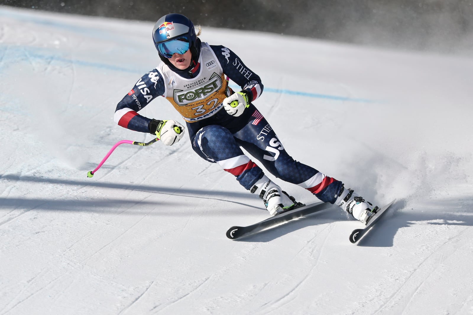 United States' Lindsey Vonn speeds down the course during an alpine ski, women's World Cup downhill training, in Cortina d'Ampezzo, Italy, Thursday, Jan. 16, 2025. (AP Photo/Marco Trovati)