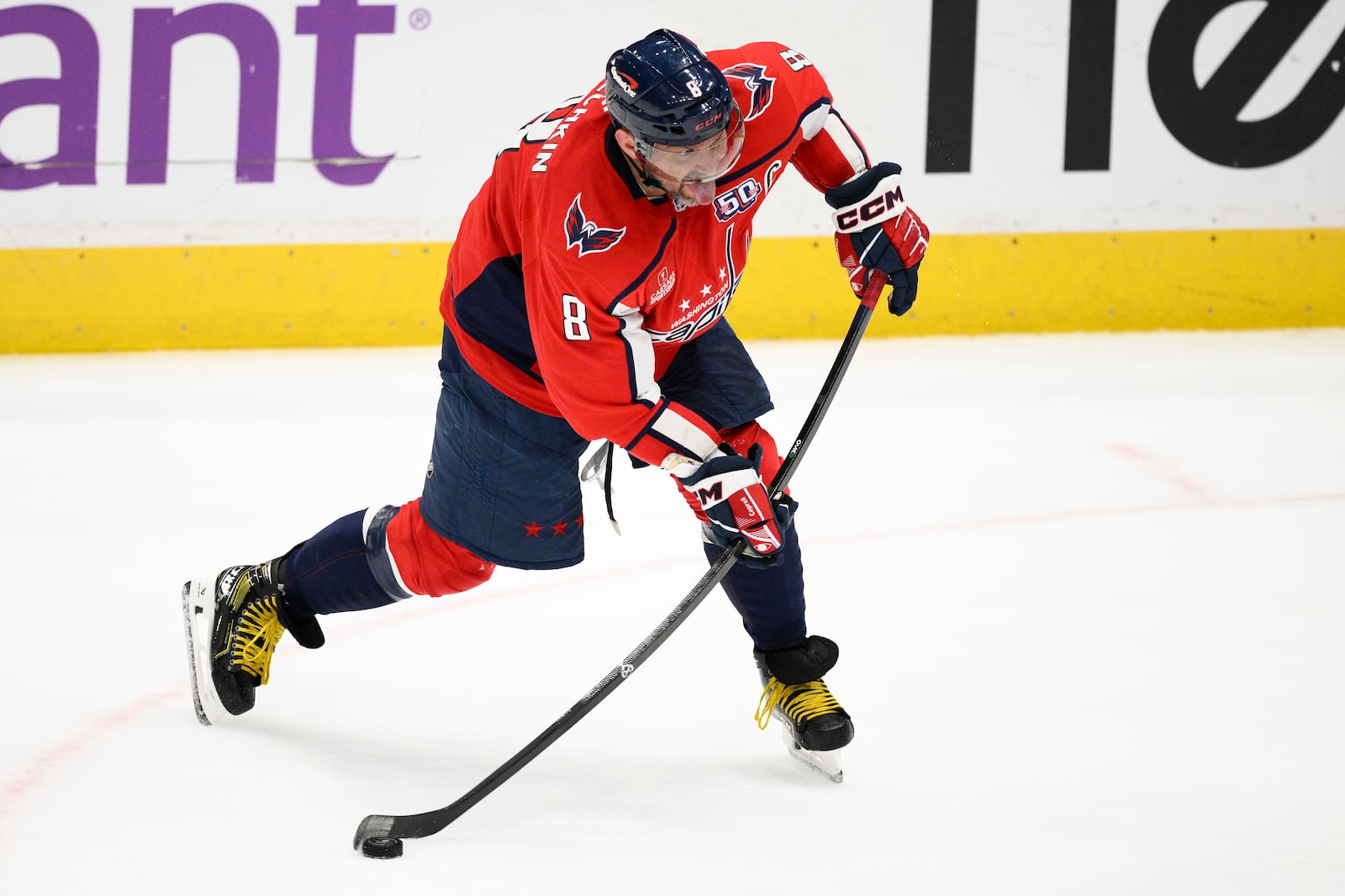 Washington Capitals left wing Alex Ovechkin winds up for a shot during the third period of an NHL hockey game against the Calgary Flames, Tuesday, Feb. 25, 2025, in Washington. (AP Photo/Nick Wass)