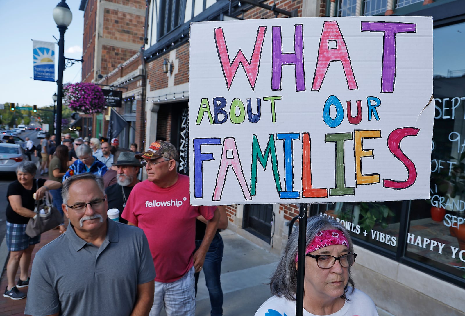 People line the sidewalk along Fountain Avenue as they wait to go into the Bushnell Banquet Center to see former presidential candidate Vivek Ramaswamy speak during a town hall meeting in Springfield Thursday, Sept. 19, 2024. BILL LACKEY/STAFF