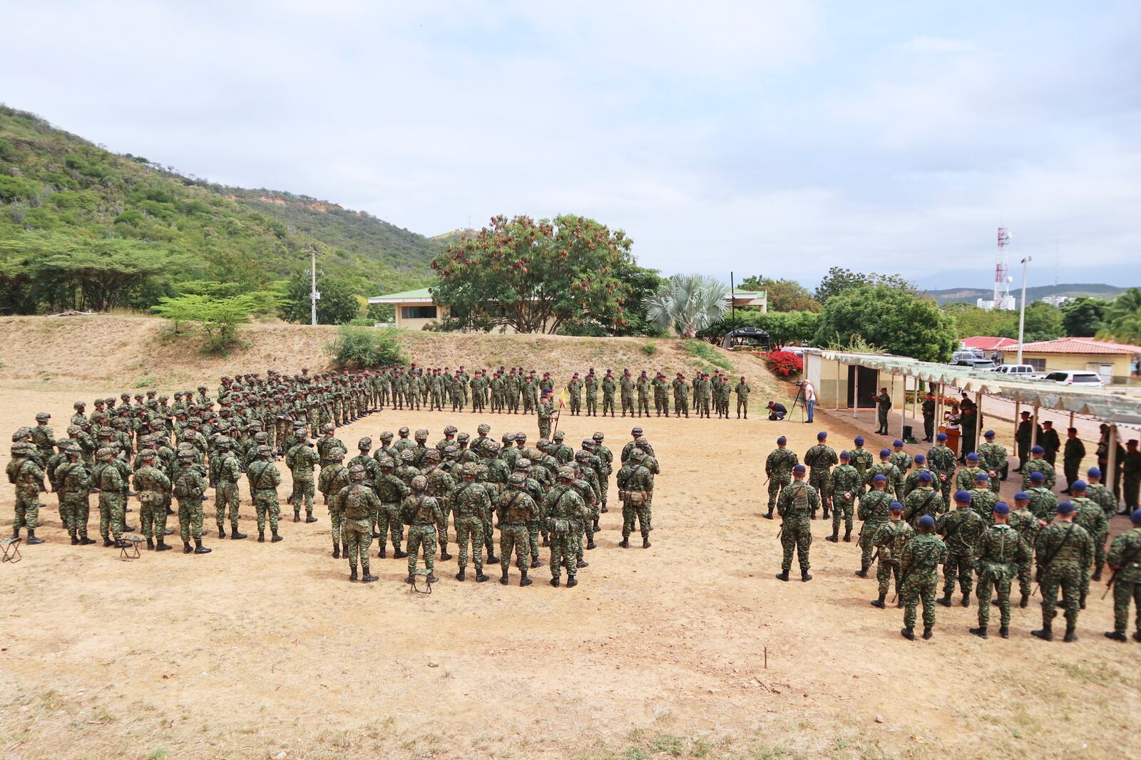 Troops line up for review by Colombian Army commander Luis Cardozo in Cucuta, south of the Catatumbo region, where former Revolutionary Armed Forces of Colombia (FARC) holdouts retreated after being driven out by National Liberation Army (ELN) rebels, Saturday, Jan. 25, 2025. (AP Photo/Mario Caicedo)