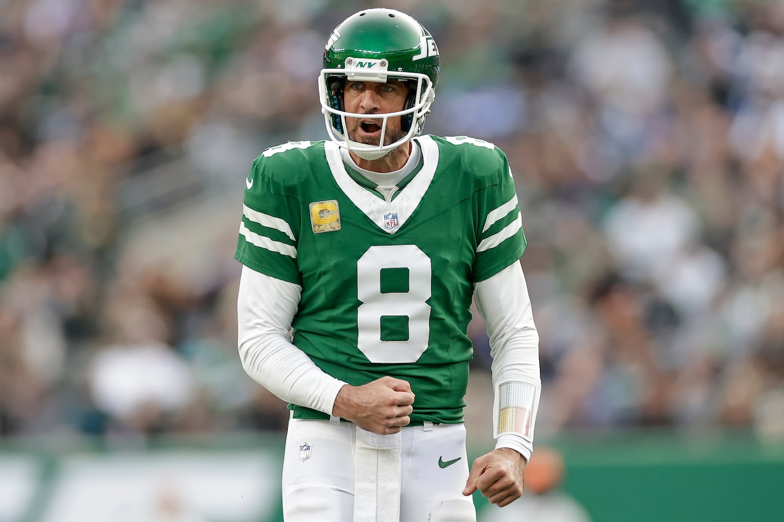 New York Jets quarterback Aaron Rodgers (8) reacts during the fourth quarter of an NFL football game against the Indianapolis Colts, Sunday, Nov. 17, 2024, in East Rutherford, N.J. (AP Photo/Adam Hunger)