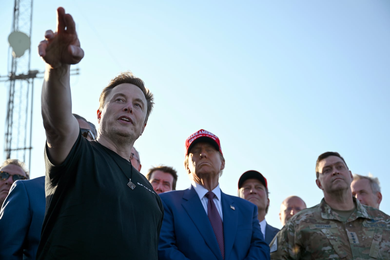 FILE - Elon Musk talks with President-elect Donald Trump before the launch of the sixth test flight of the SpaceX Starship rocket Tuesday, Nov. 19, 2024 in Boca Chica, Texas. (Brandon Bell/Pool via AP, File)