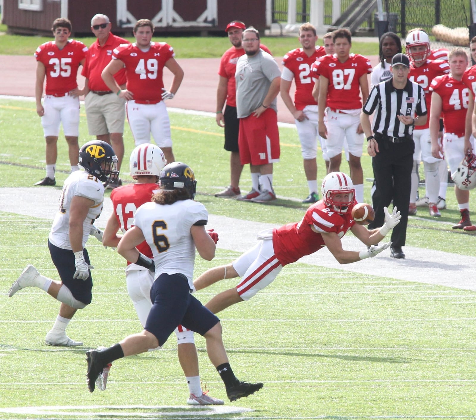 Wittenberg’s Sam Kayser makes a catch against Allegheny on Saturday, Oct. 14, 2017, at Edwards-Maurer Field in Springfield. David Jablonski/Staff