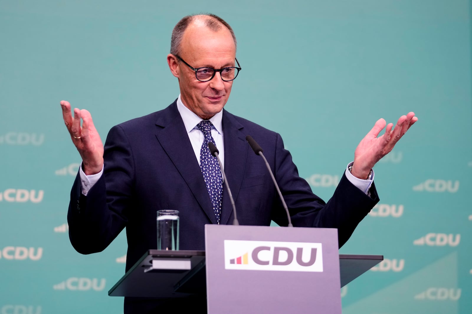 Friedrich Merz, leader of the Christian Democratic Union (CDU), speaks during a news conference at the headquarters of Christian Democratic Union (CDU) party in Berlin, Germany, Monday, Feb. 24, 2025. (AP Photo/Martin Meissner)