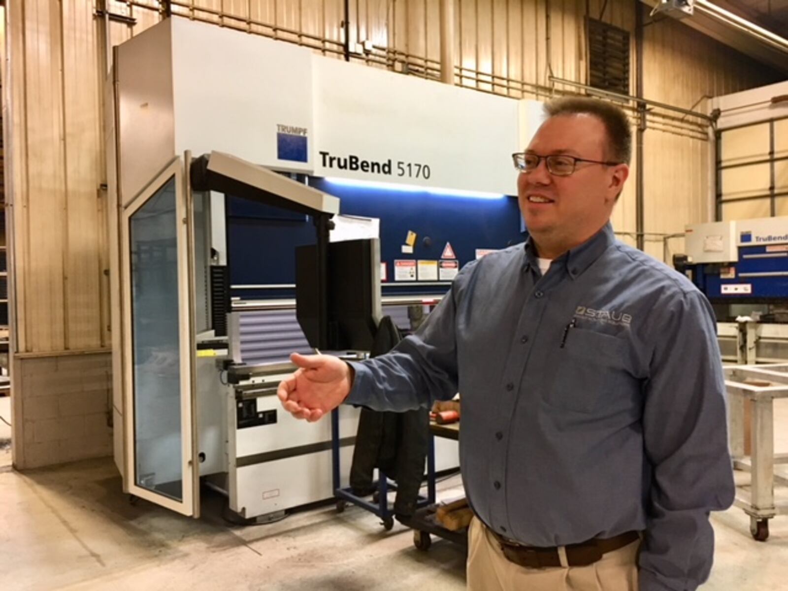 Steve Staub, president and co-owner of Staub Manufacturing Solutions of Dayton, in the plant. THOMAS GNAU/STAFF