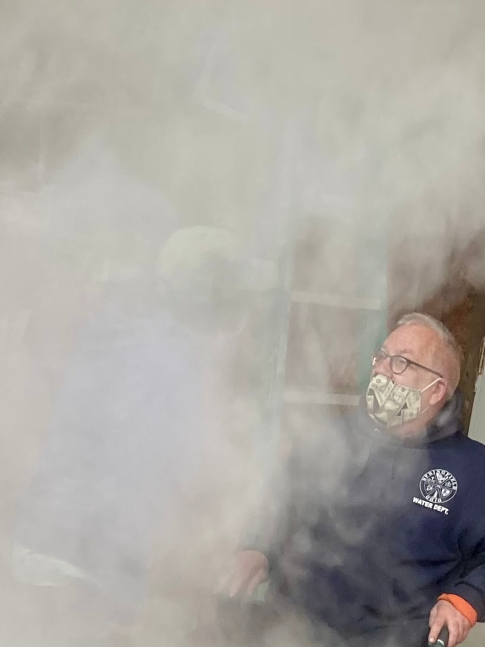 Neal Rockwell sits in the steam emitted by the sap cooker in Ben Hamilton's sugar shack. TOM STAFFORD/CONTRIBUTED