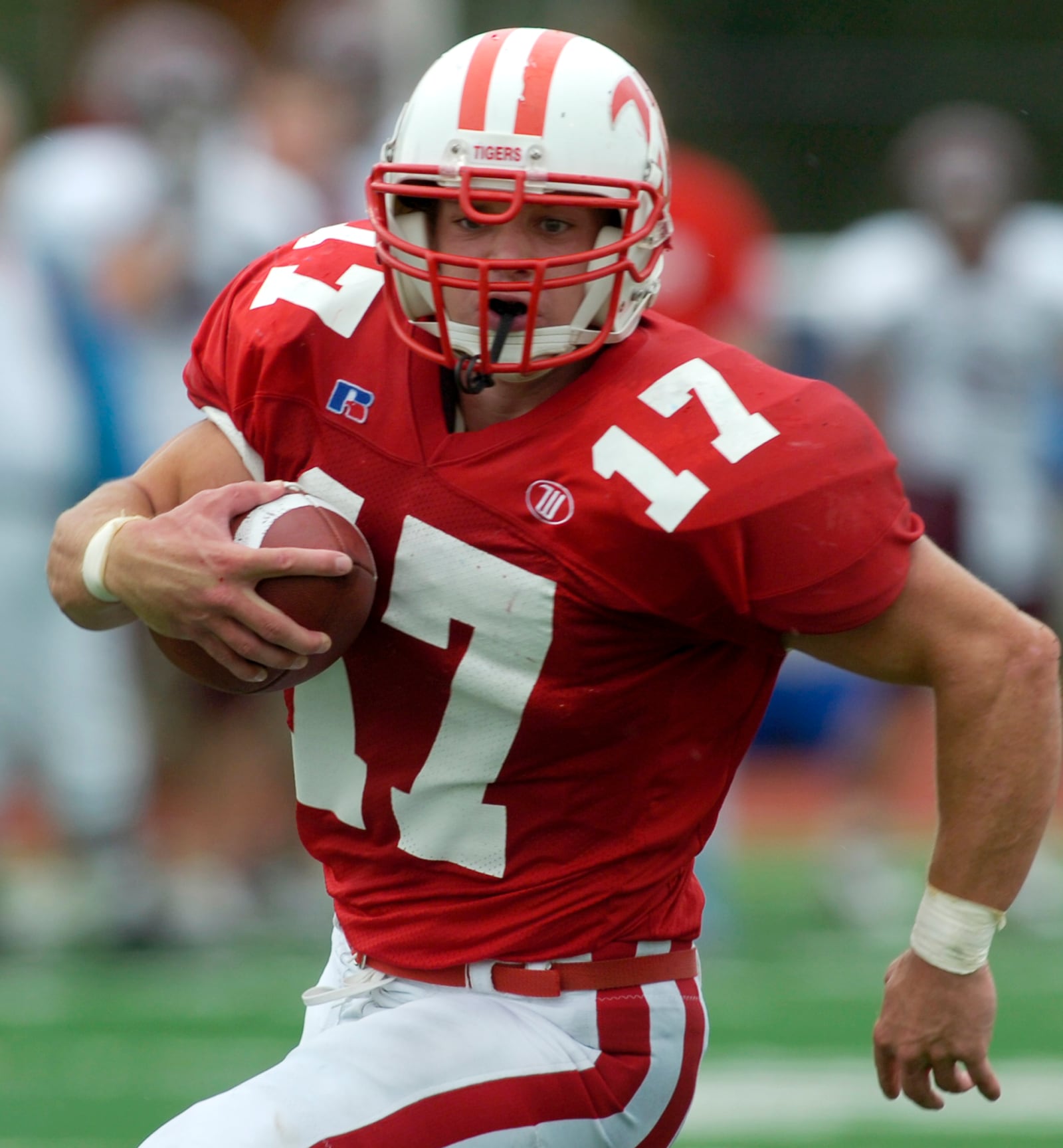 Wittenberg's Adam Hewitt eyes the goal line as he sprints to a Tigers touchdown after recovering a fumble in 2006.  Staff photo by Bill Lackey