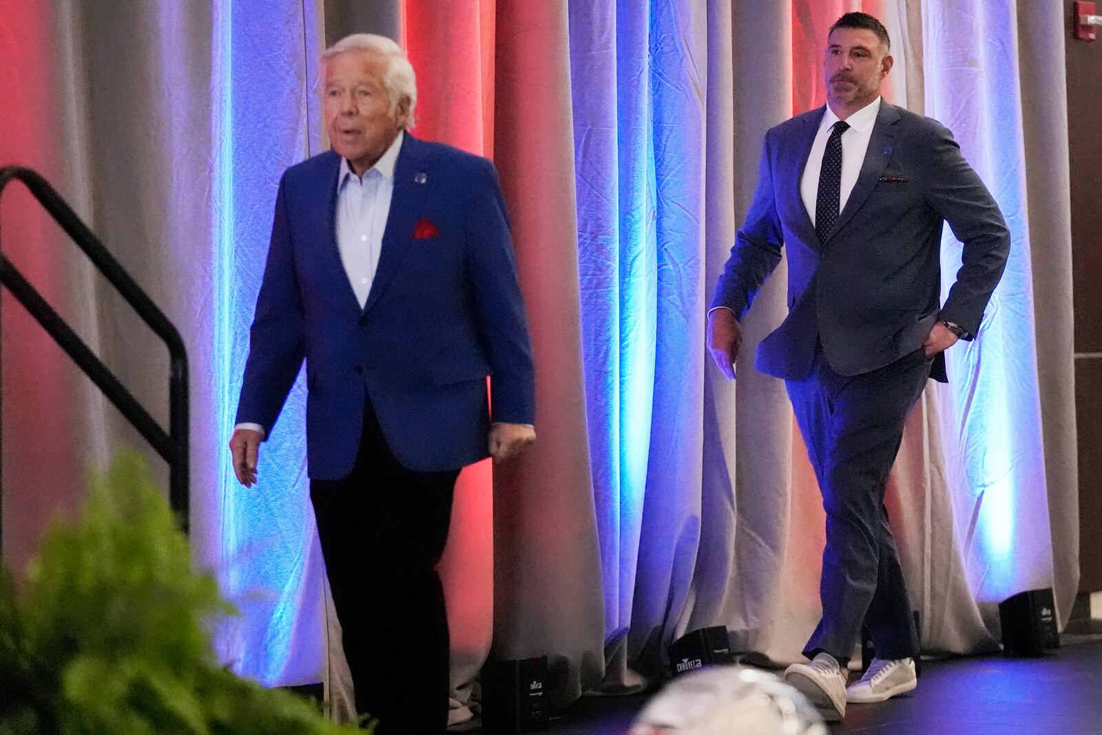 New England Patriots head coach Mike Vrabel, right, follows team owner Robert Kraft while being introduced during an availability, Monday, Jan. 13, 2025, in Foxborough, Mass. (AP Photo/Charles Krupa)