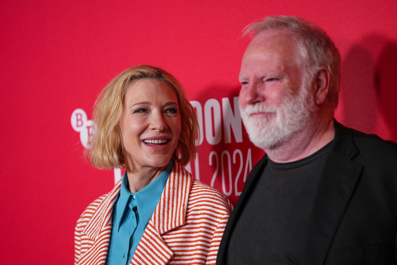 Cate Blanchett, left, and director Guy Maddin pose for photographers upon arrival at the premiere of the film 'Rumours' during the London Film Festival on Sunday, Oct. 13, 2024, in London. (Photo by Scott A Garfitt/Invision/AP)