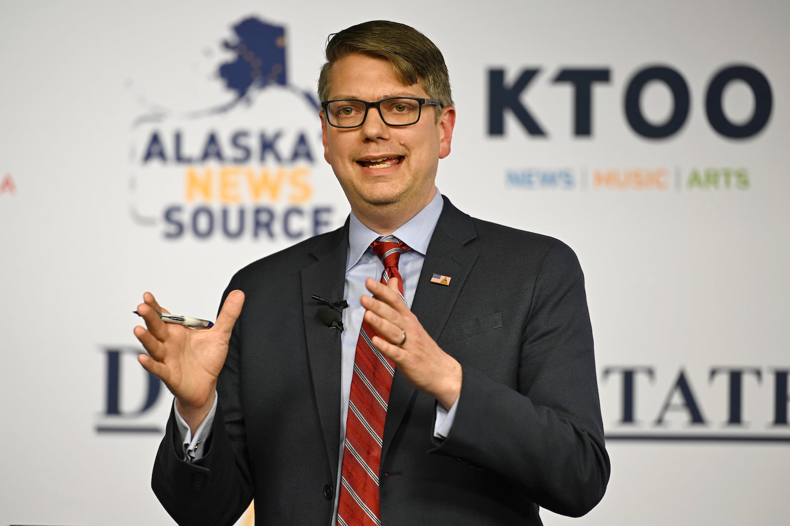 Republican U.S. House candidate Nick Begich answers a question during a debate on live television with incumbent Democratic Rep. Mary Peltola at Alaska Public Media on Thursday, Oct. 10, 2024. (Bill Roth/Anchorage Daily News via AP)